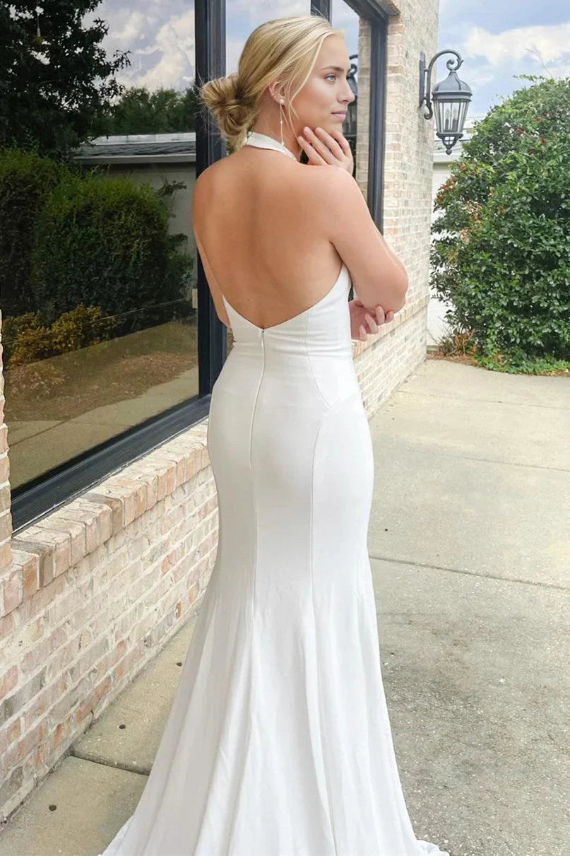 Side view of the long halter wedding dress.