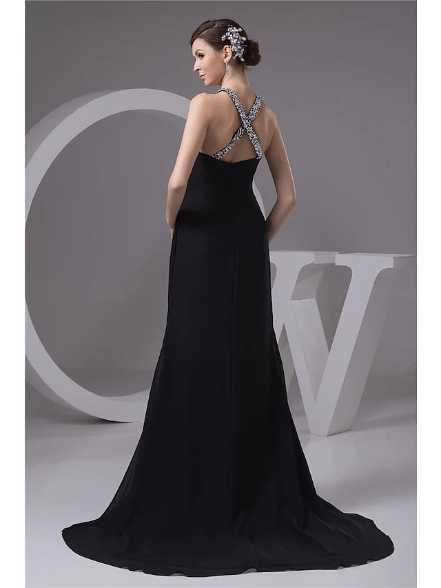 Full-length view of the elegant chiffon evening gown, emphasizing its flowing design.