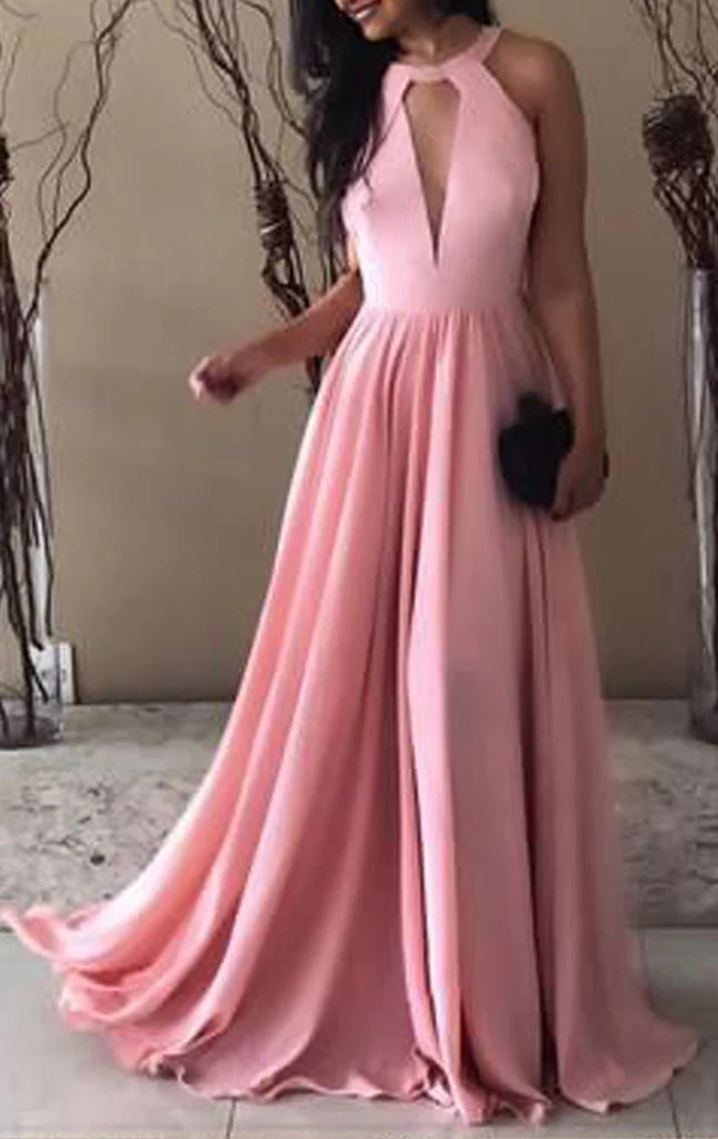 Model wearing an elegant halter neck chiffon long prom dress.