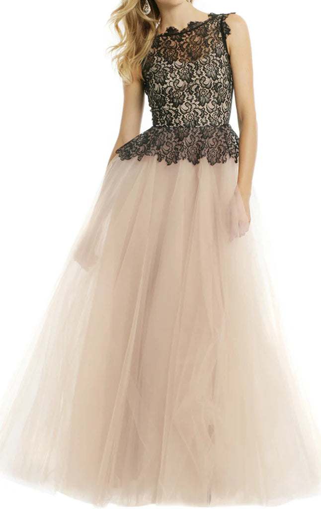 Elegant woman wearing a long halter neck lace tulle prom dress ball gown.