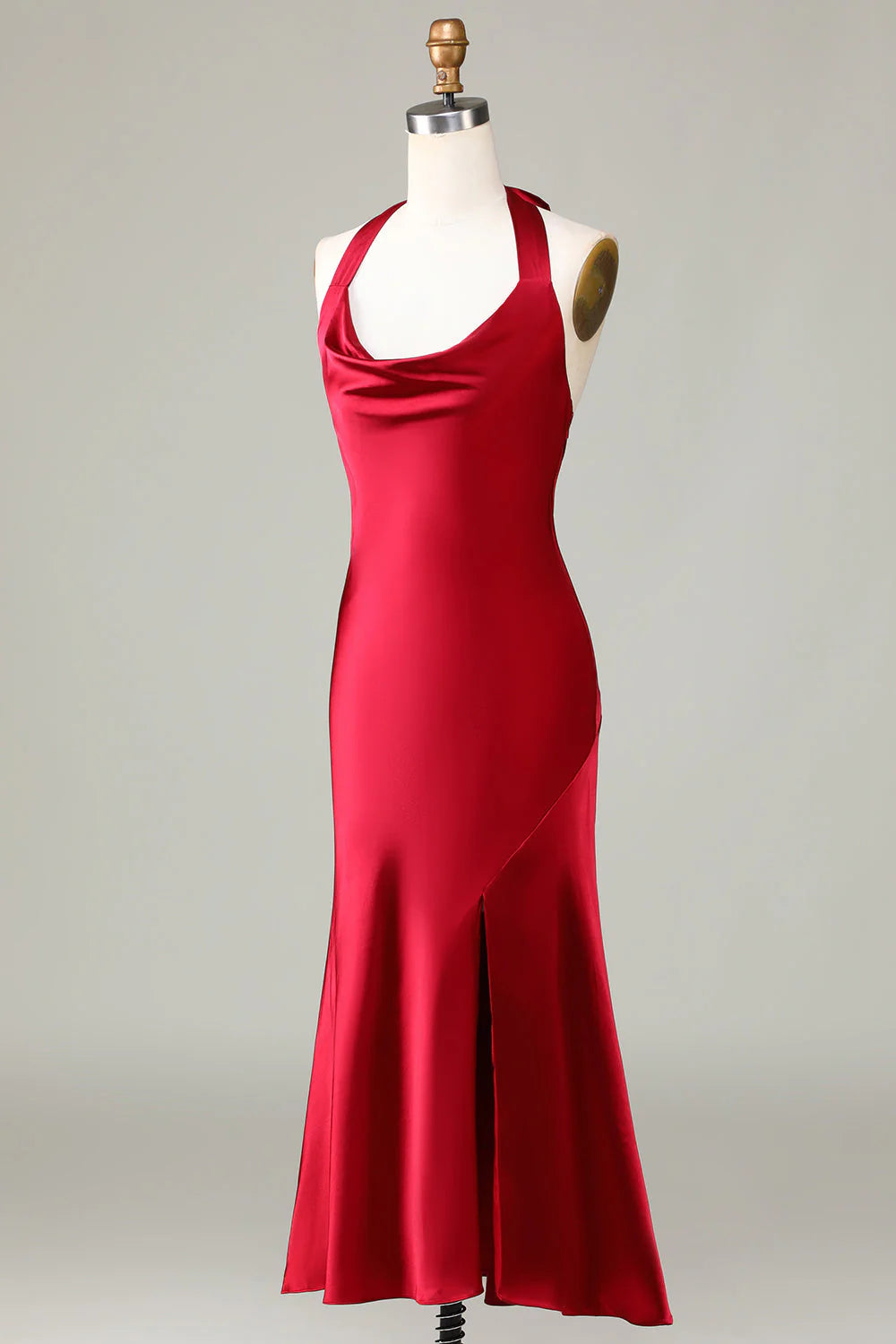 Model posing to highlight the stylish side slit of the long bridesmaid dress.