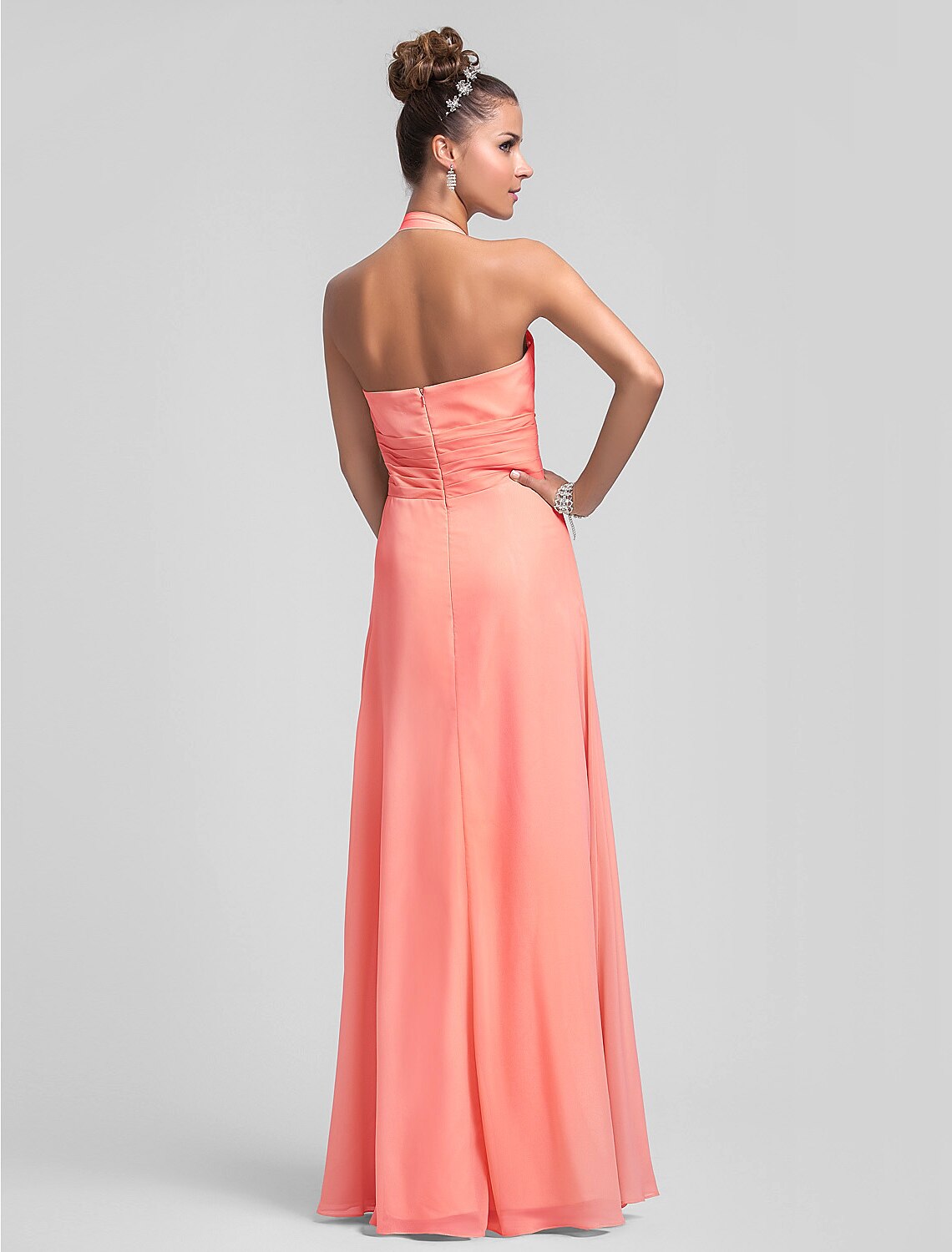 Full length view of a flowing chiffon bridesmaid dress.