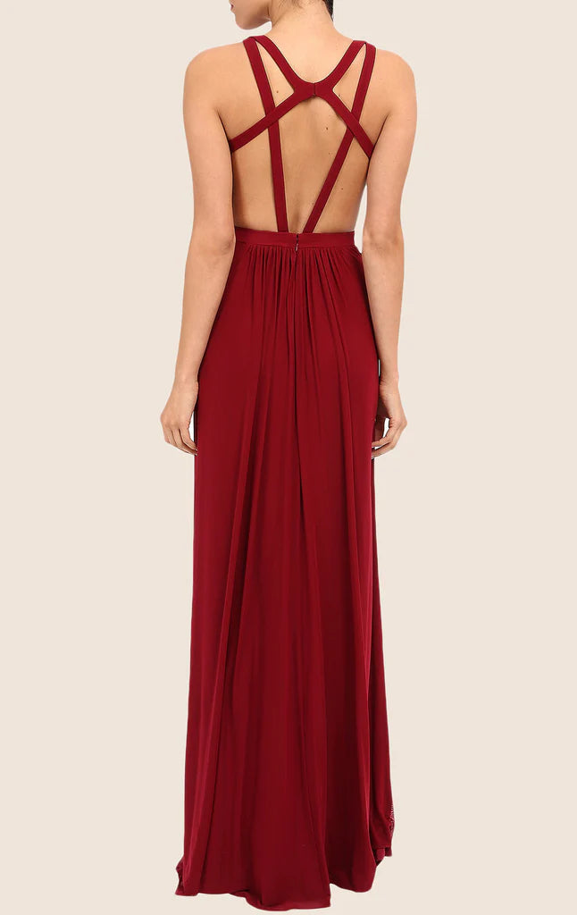 Close-up of the halter neckline and flowing chiffon fabric of the formal gown.