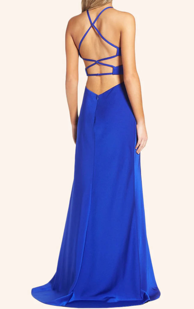 Woman posing in a sophisticated halter sheath long prom dress.