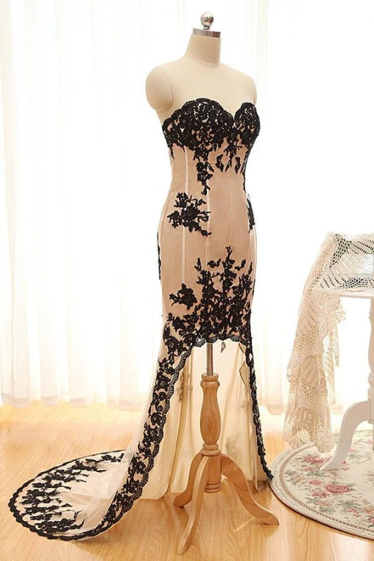 Model wearing the elegant high-low lace formal gown.