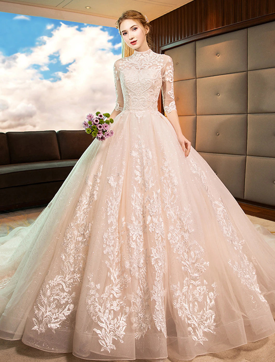Elegant high neck long sleeve ball gown wedding dress with sequin lace and cathedral train.