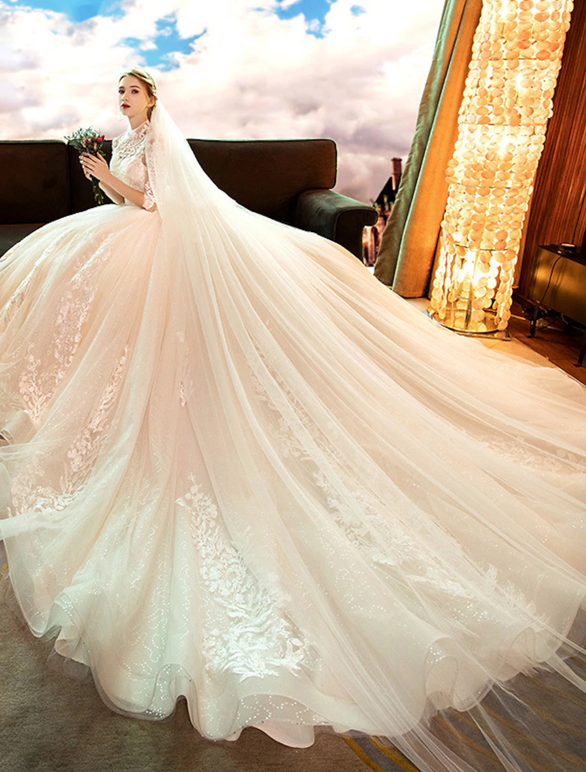 Close-up of sequin and lace detailing on a long sleeve wedding dress.