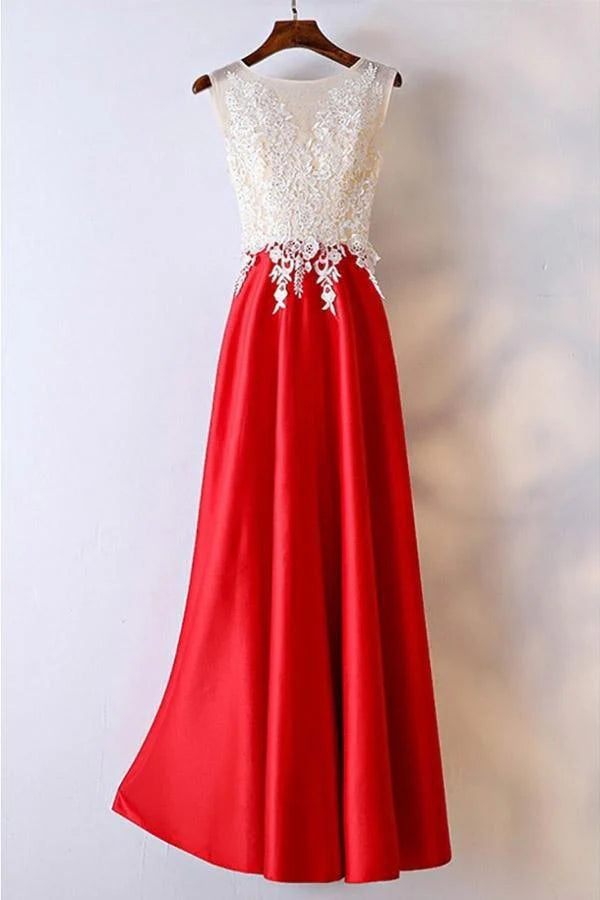 Woman wearing an elegant long sleeve lace formal prom gown with a high neck.