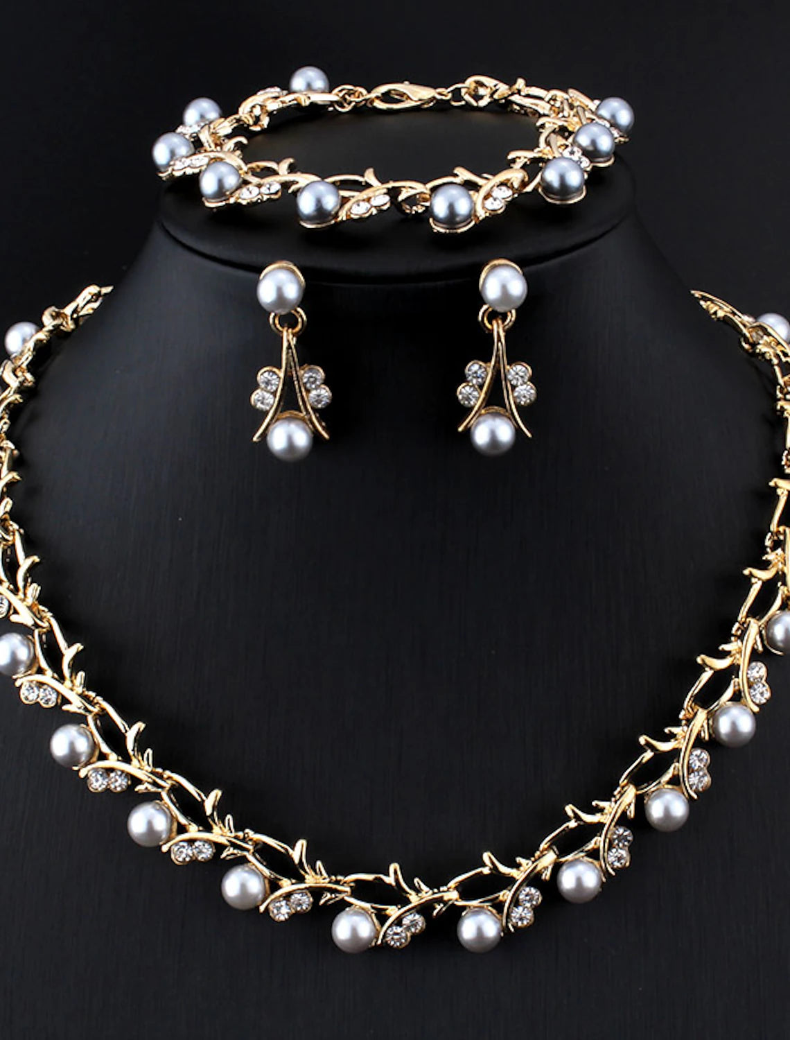 Close-up of imitation diamond bridal necklace with briolette drop.