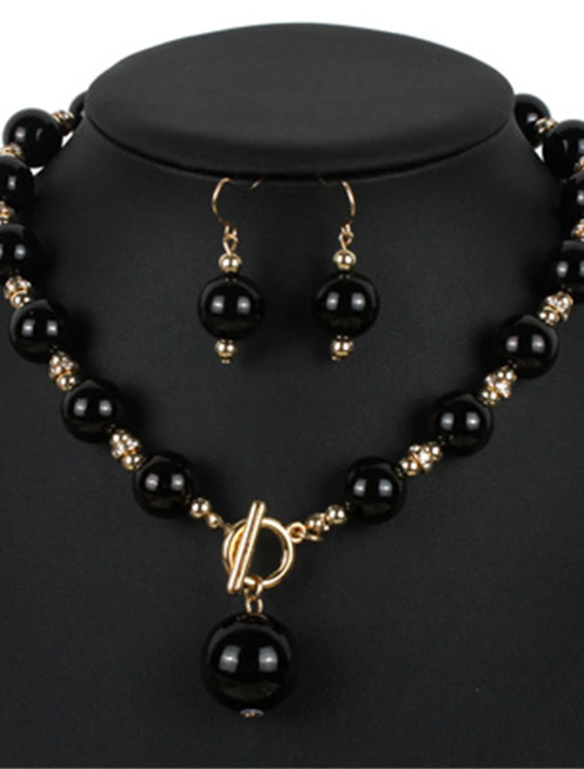 Bride wearing the imitation pearl jewelry set, side view.