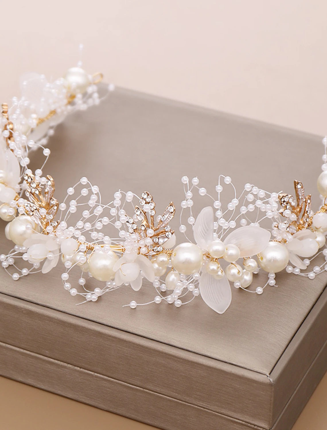 Elegant imitation pearl and rhinestone wedding tiara headband.