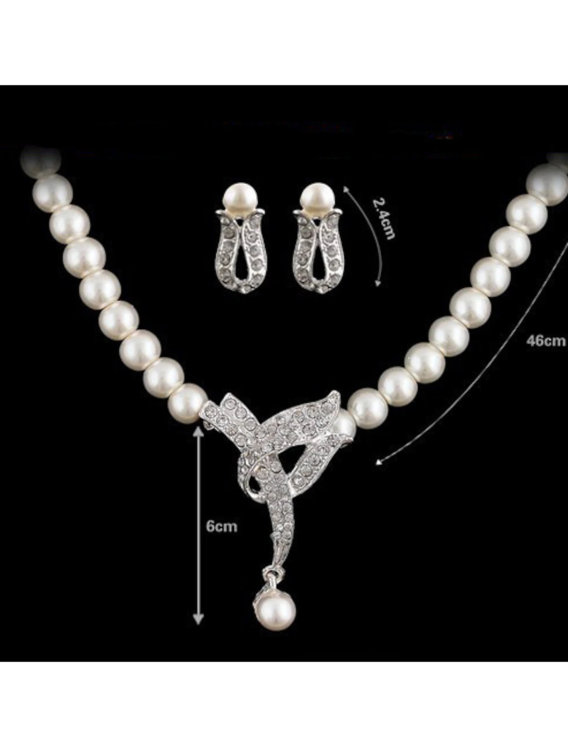 Elegant imitation pearl and rhinestone bridal jewelry set, including necklace and earrings.