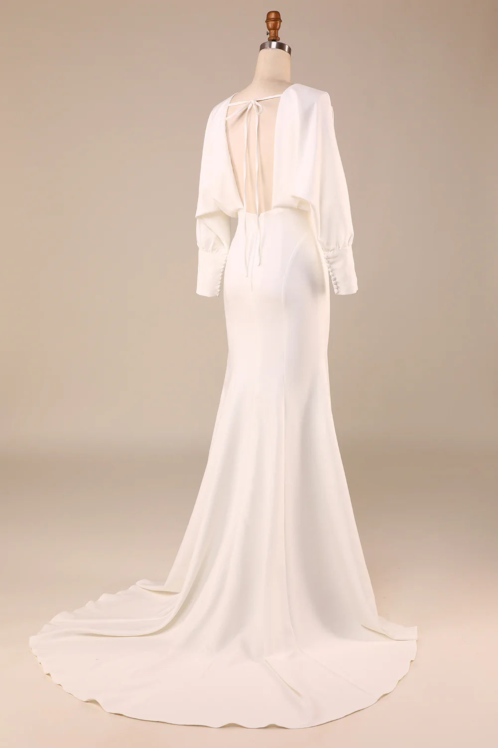 Back view of ivory satin wedding dress showing sweep train detail.