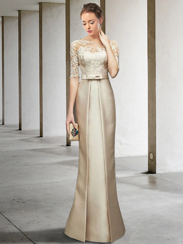 Elegant mermaid trumpet Mother of the Bride dress with jewel neck and half sleeves.