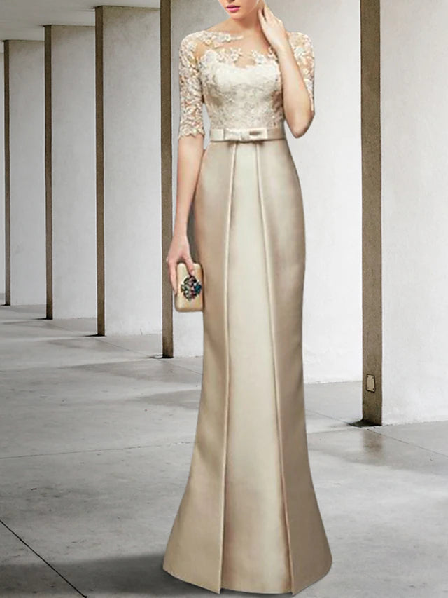 Back view of knee-length mermaid trumpet dress with elegant detailing.