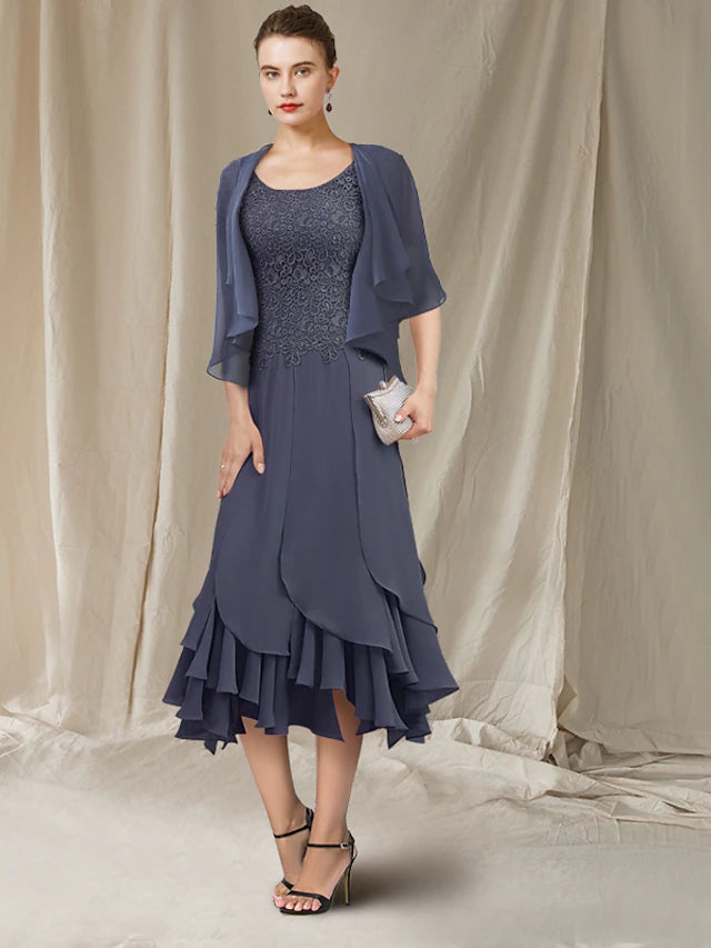 Elegant mermaid tea length Mother of the Bride dress with jewel neck and short sleeves.