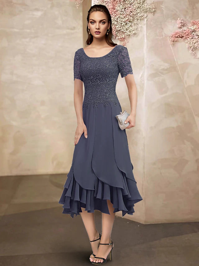 Side profile of the elegant Mother of the Bride dress, highlighting the asymmetrical design.