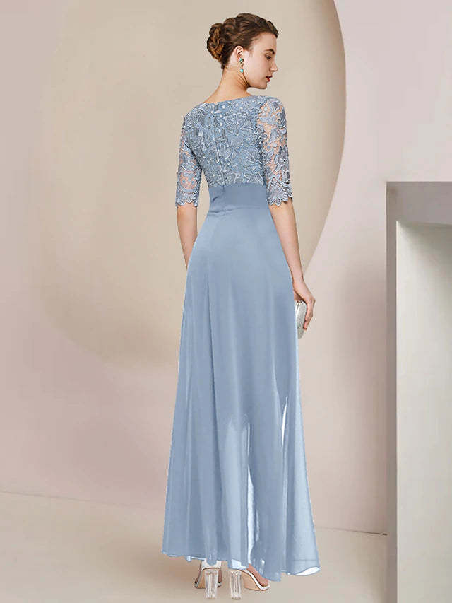 Close-up of the delicate lace and applique details on the dress.