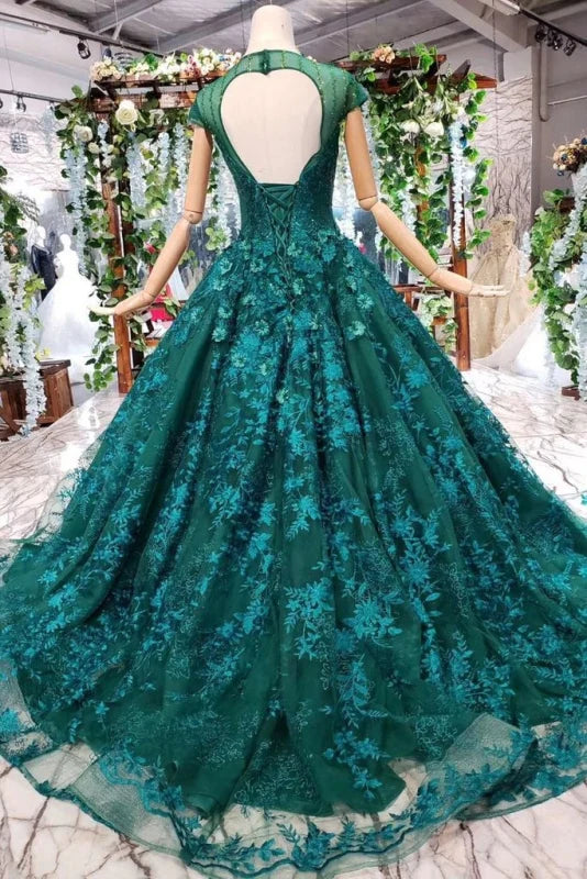 Back view of the lace ball gown showing intricate floral beadwork.