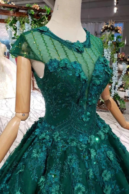 Close-up of the lace and floral bead details on the bodice of the gown.