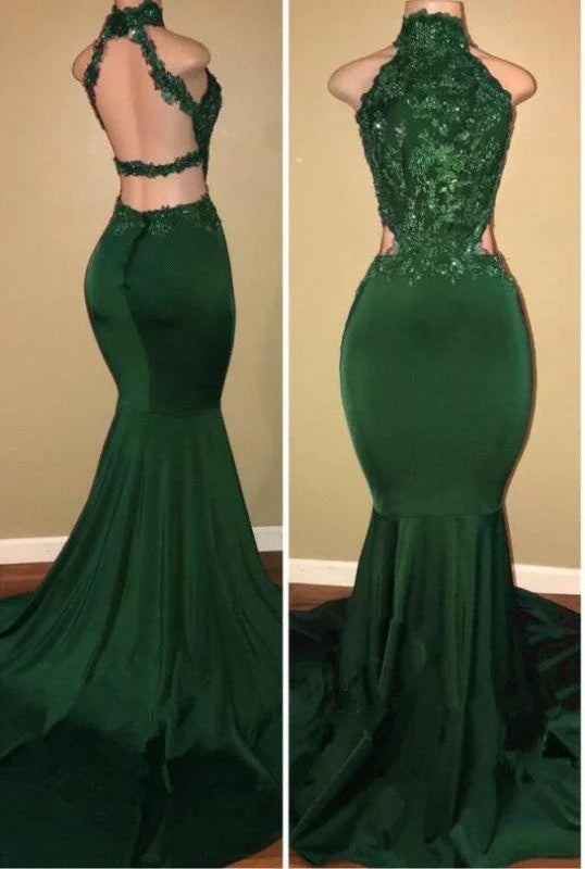 Woman wearing an elegant high-neck sleeveless lace mermaid prom dress.