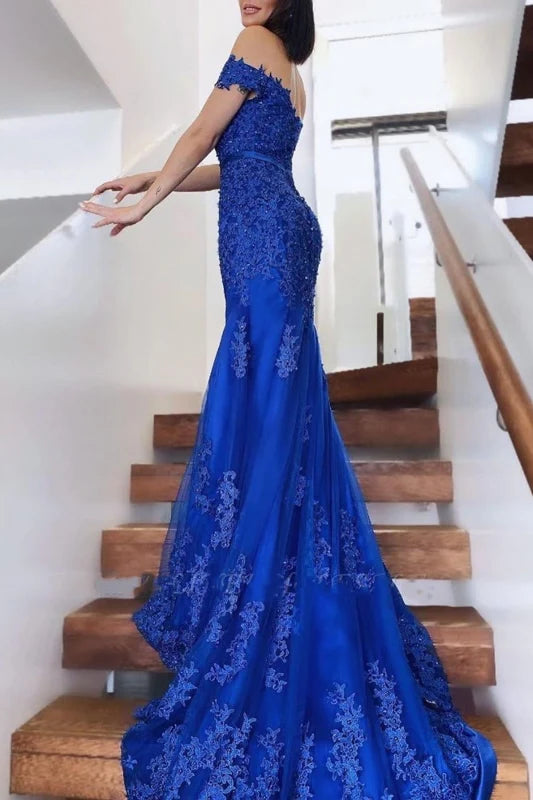 Close-up of the lace detail on the off-shoulder long prom dress.