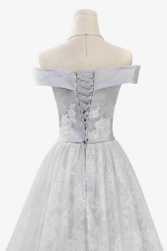 Back view of a lace off-shoulder maxi prom dress with a belt.