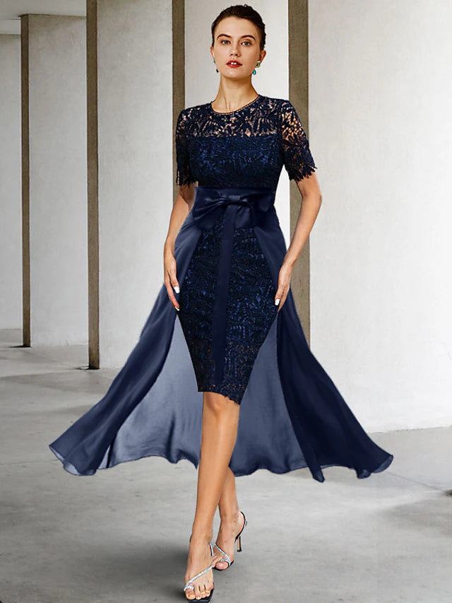 Elegant lace sheath dress with scoop neck, short sleeves, and knee length.