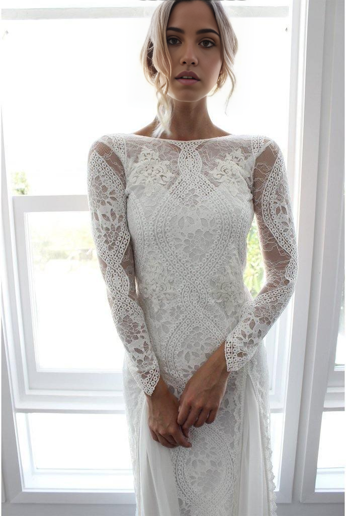 Side view of the sheath wedding dress, highlighting its flattering silhouette.