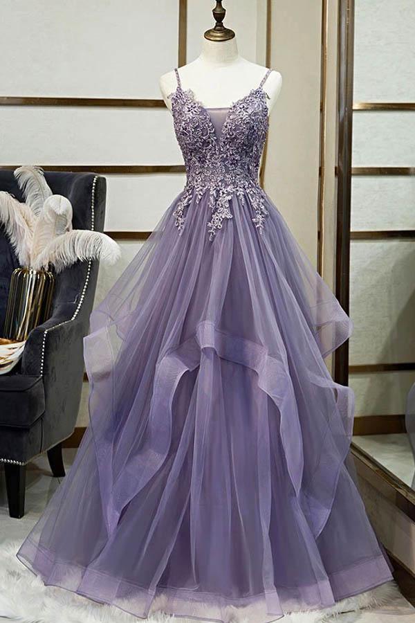 Elegant A-line lace and tulle prom dress with sweetheart neckline and spaghetti straps.