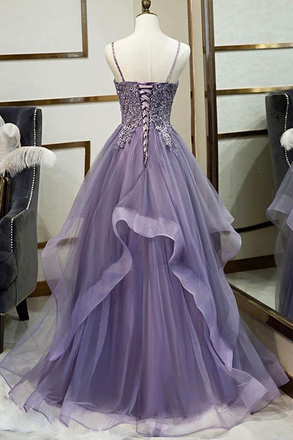 Side view of the applique lace and tulle formal gown.