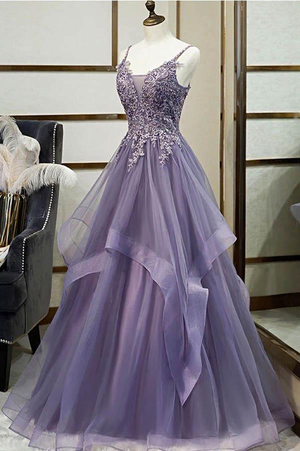 Back view of the spaghetti strap prom dress with delicate lace details.