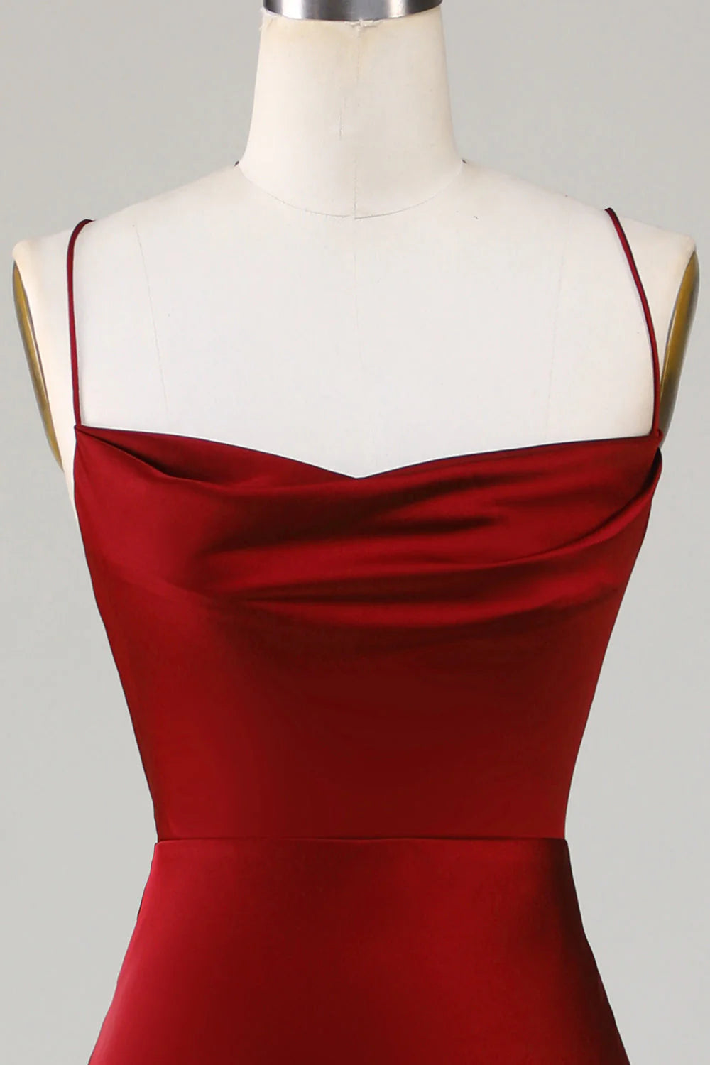 Full length view of a bridesmaid dress, showcasing its elegant silhouette.