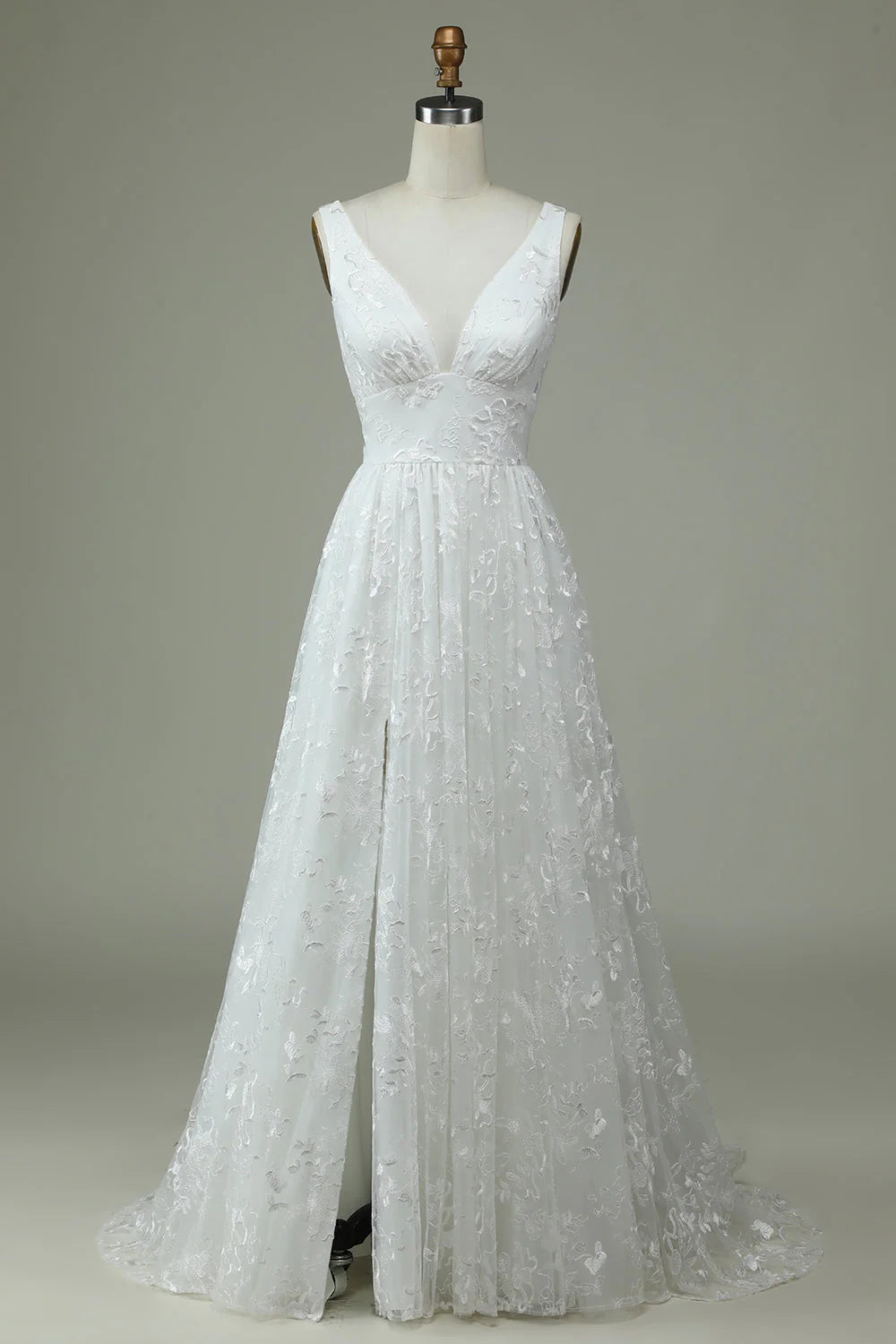 Elegant lace V-neck wedding dress with a high slit.