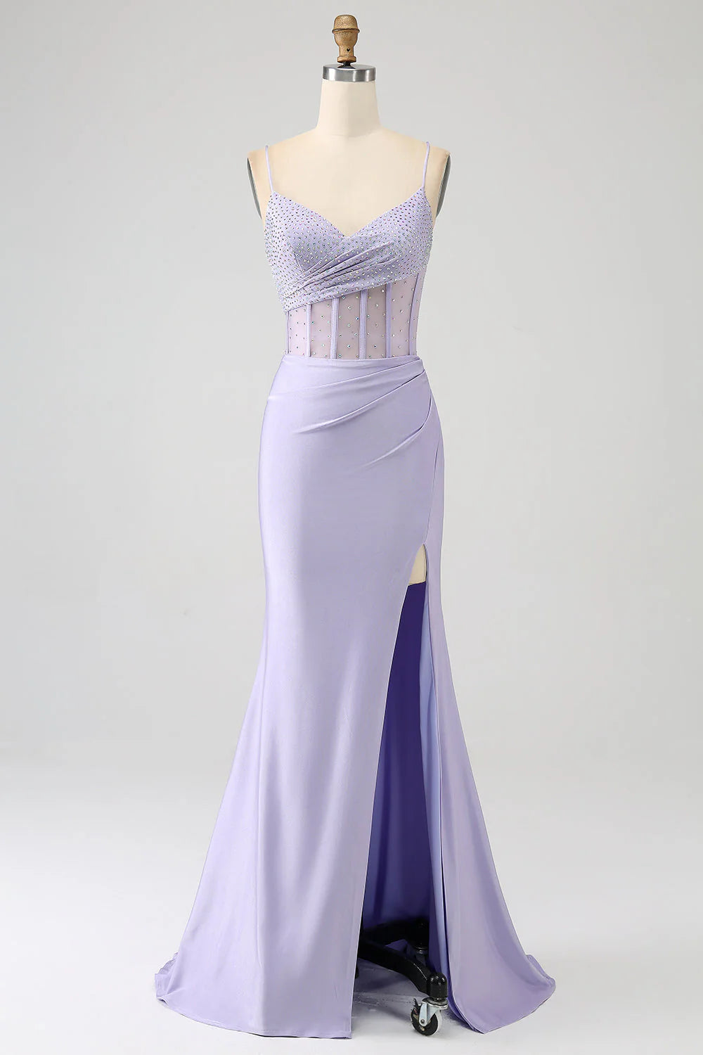 Elegant lavender mermaid prom dress with a high slit.