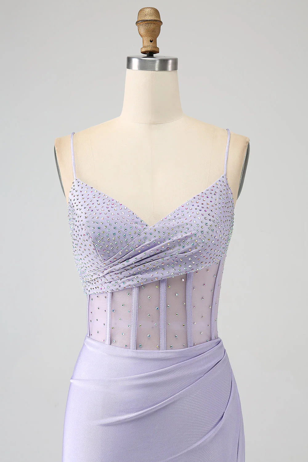 Back view of the elegant lavender mermaid gown, showcasing its flowing train.