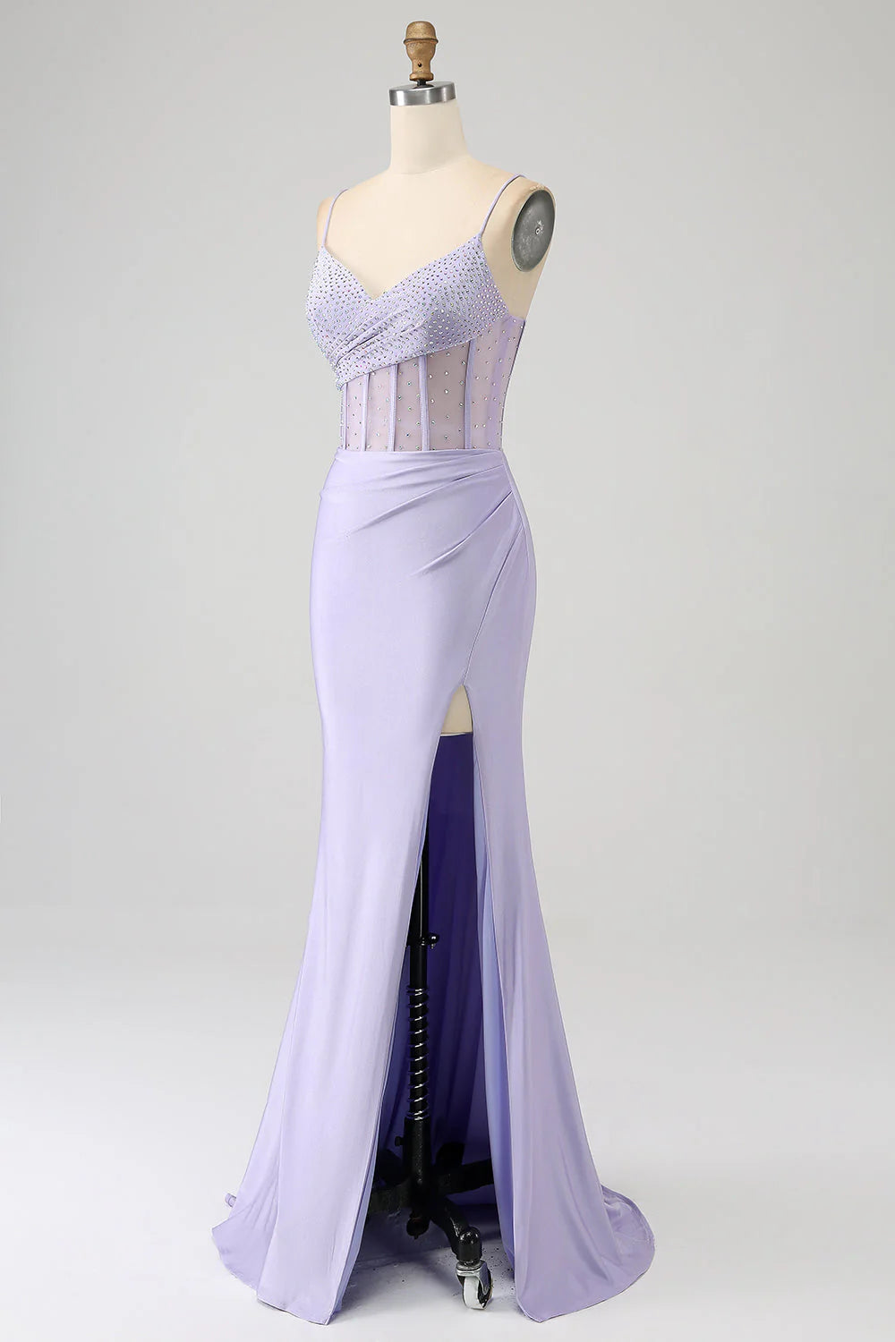 Close-up of the lavender mermaid dress, focusing on the fabric and slit detail.