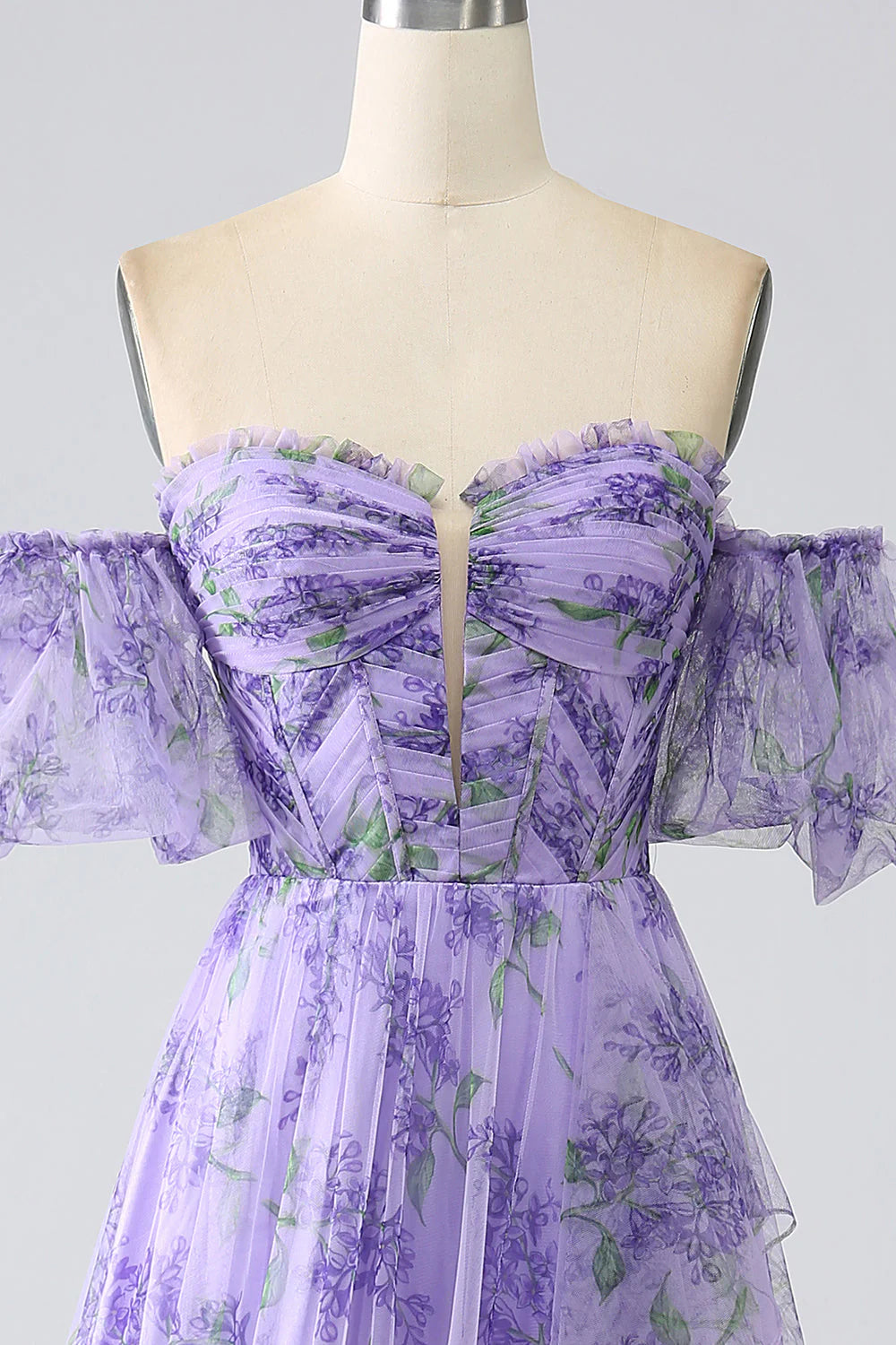Side view of elegant lavender off-shoulder prom dress.