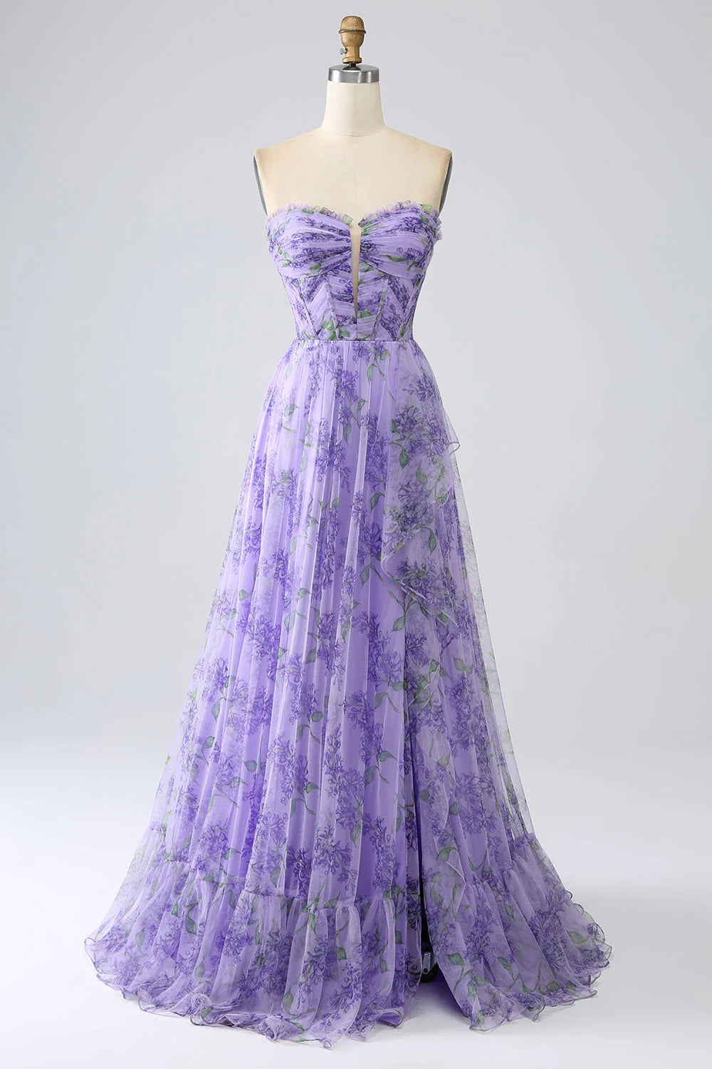 Model posing in lavender A-line gown with removable sleeves.