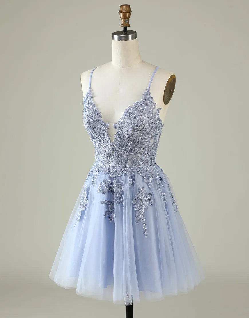 Side view of lavender short homecoming dress with appliques.