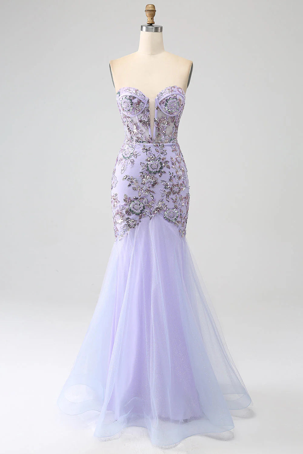 Light purple mermaid strapless prom dress with intricate beading.