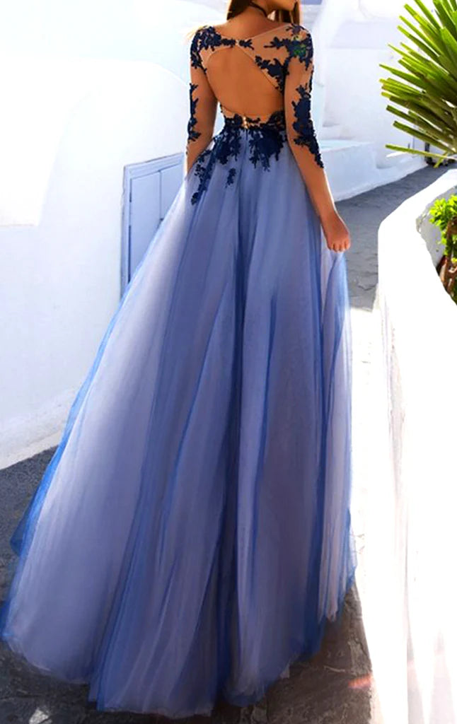 Back view of the elegant long sleeve lace and tulle formal gown.