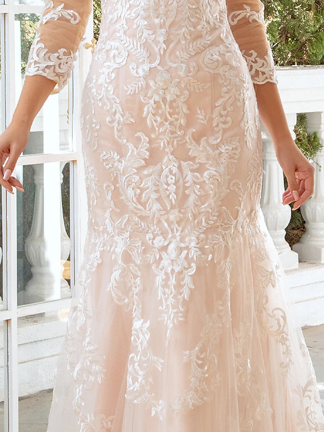 Full length view of the elegant mermaid trumpet bridal gown.