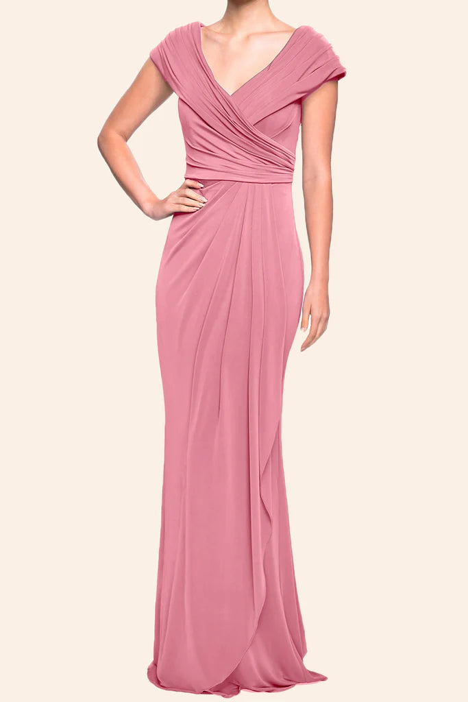 Woman wearing an elegant long sleeve V-neck Mother of the Bride dress.