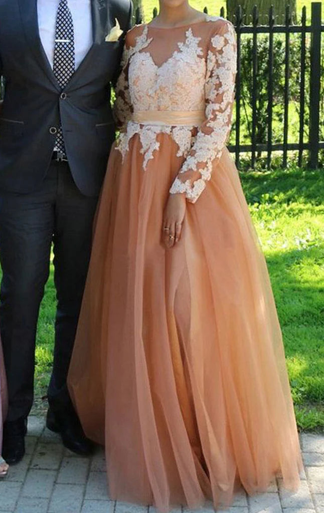 Elegant long sleeves lace tulle prom dress in a light color.