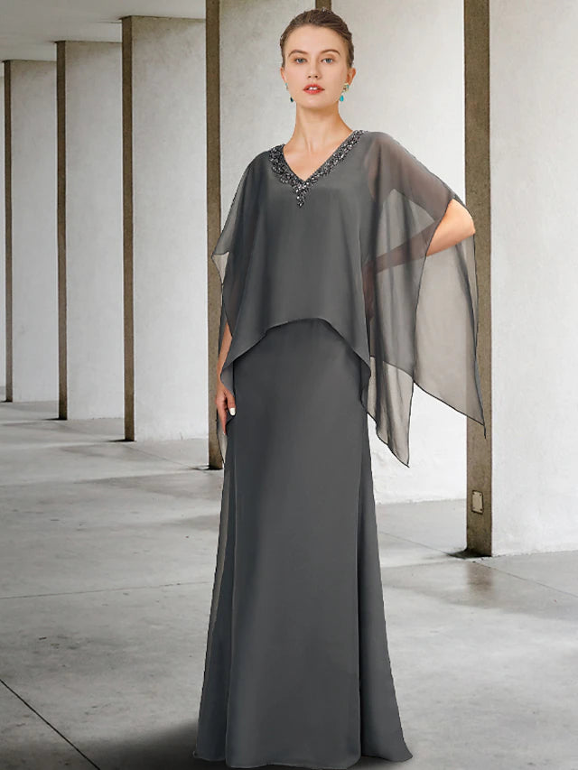 Elegant A-line Mother of the Bride dress in chiffon with V-neck, beading, and ruffles.