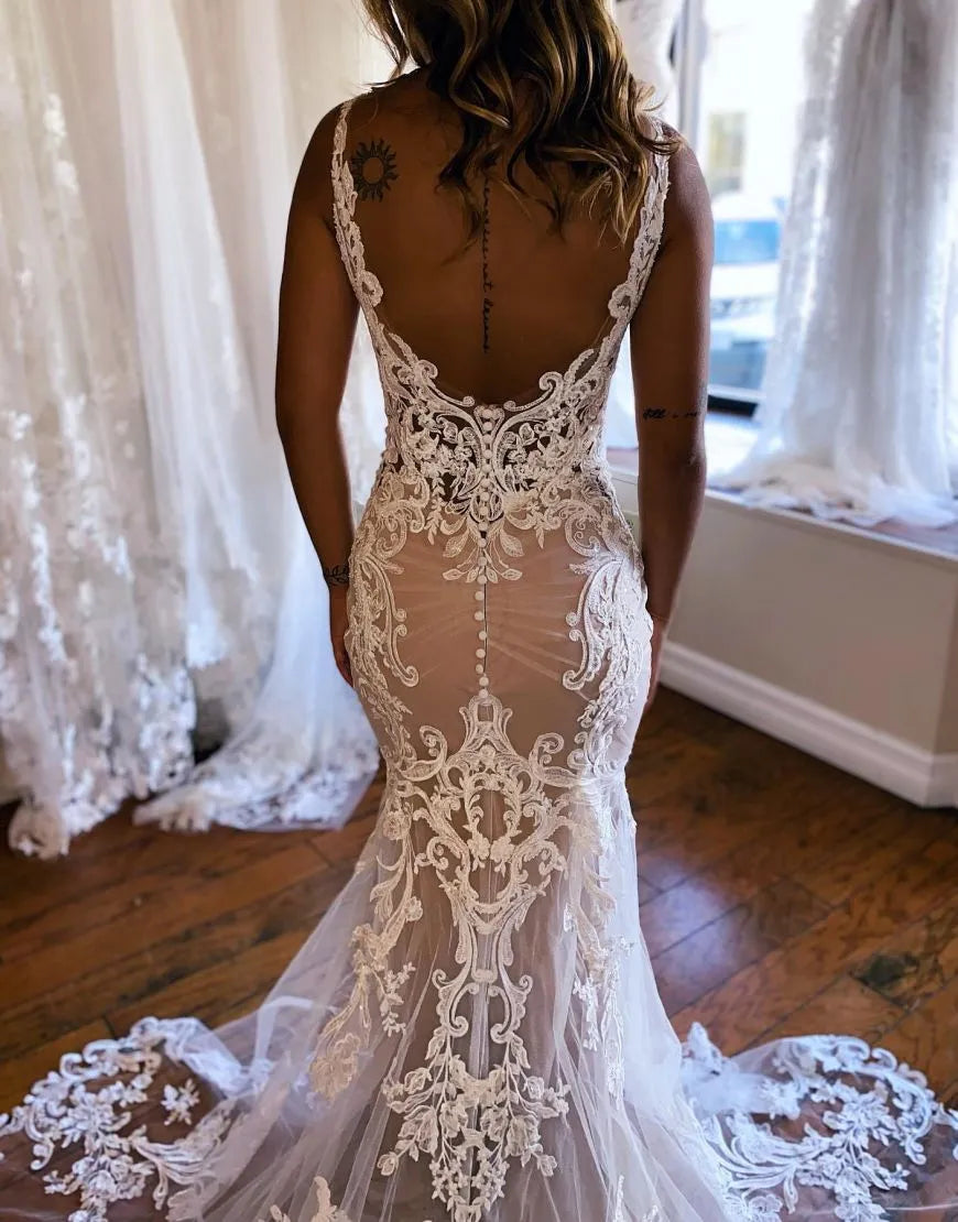 Back view of dark champagne mermaid wedding dress with appliques.
