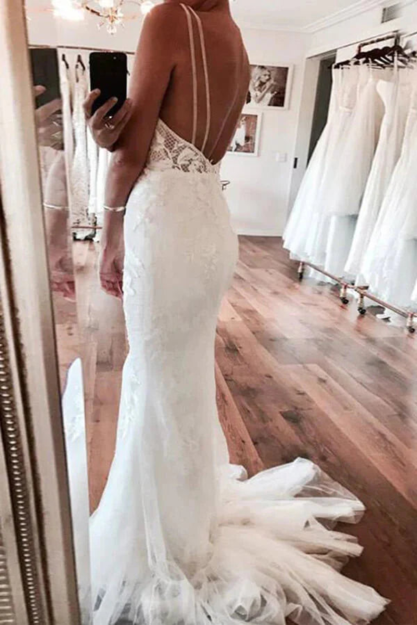 Ivory mermaid backless deep V-neck lace wedding dress.