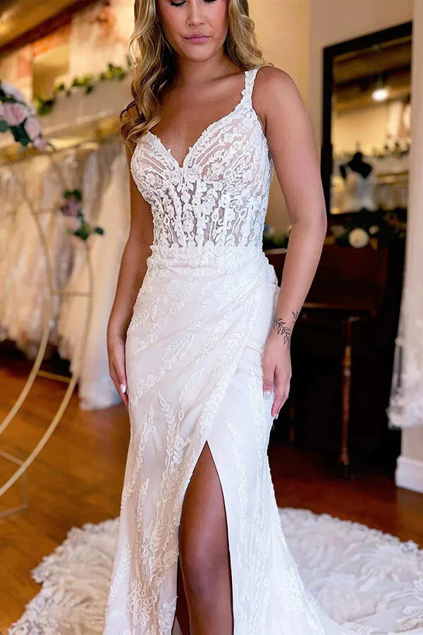Mermaid wedding dress featuring a backless design and intricate lace details.