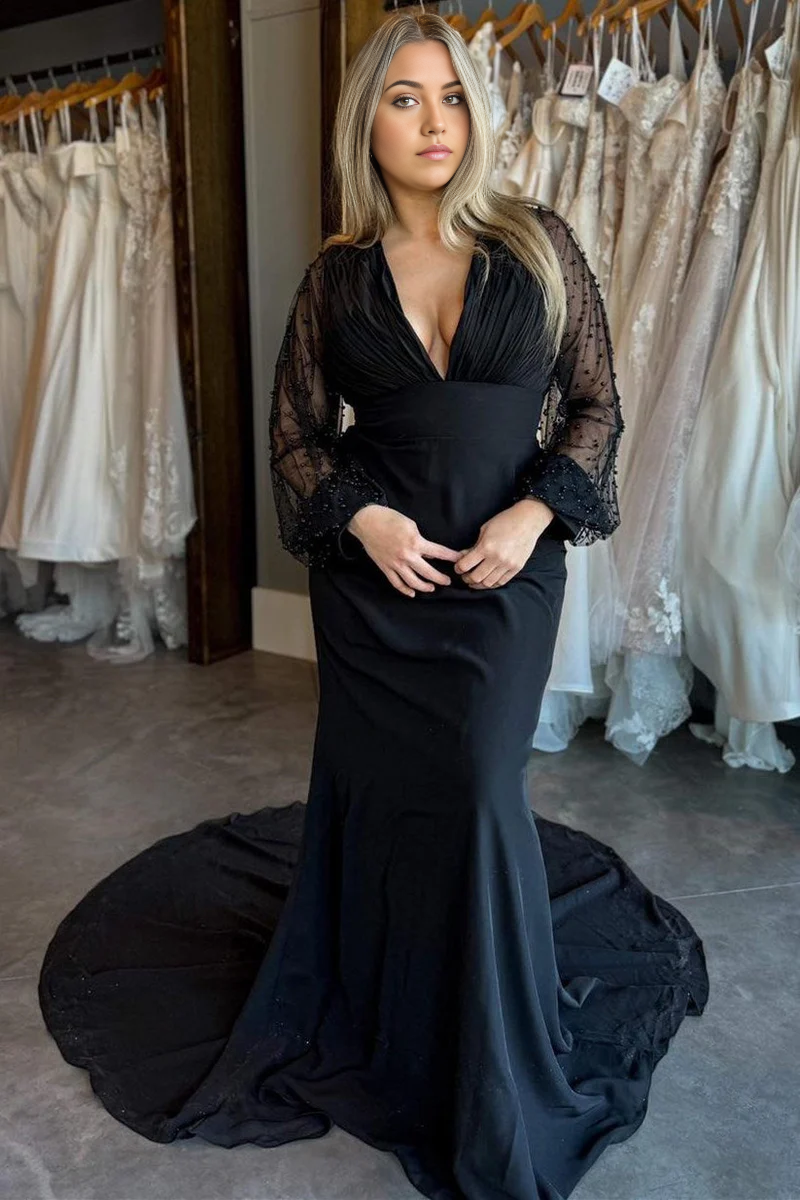 Elegant mermaid wedding dress with V-neck, long sleeves, and beaded details.